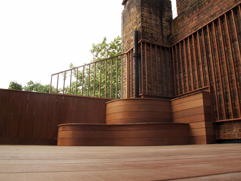 Hardwood ipe decking on the roof terrace, custom made sitting & trellis. Earls Court, London SW5 