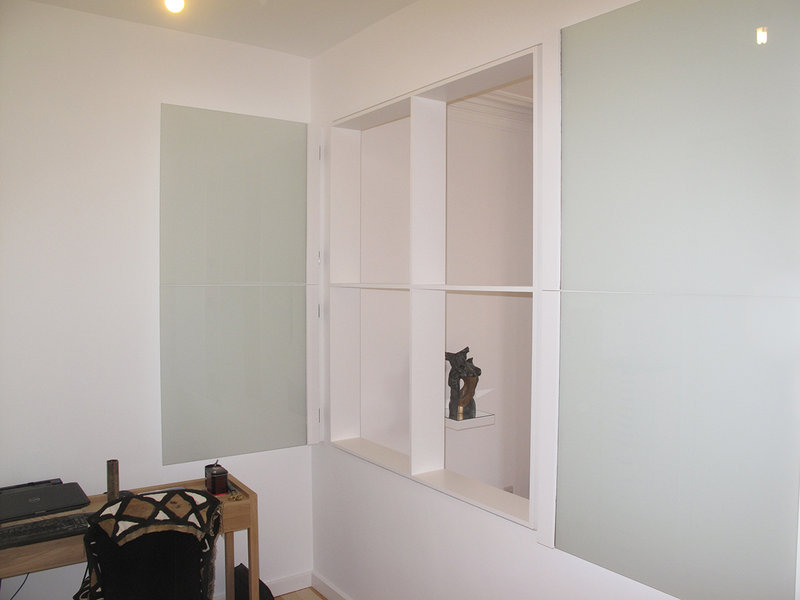 Home office remodeled. Studded, dry lined & plastered. New maple strip flooring, new wall opening with 4 frameless individually hinged & frosted glass panels. Hampstead NW3, London 
